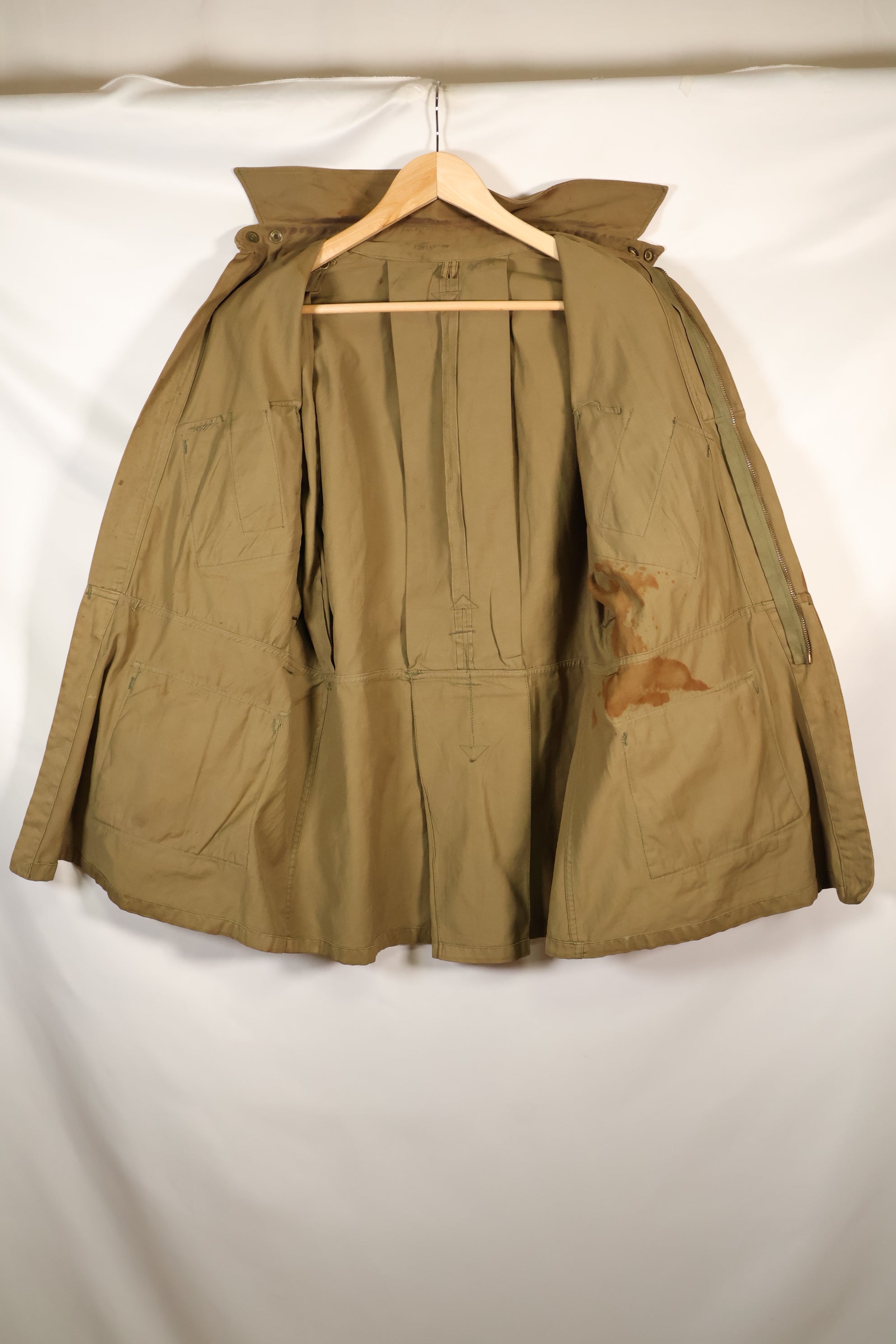 1940s 40R WWII M42 jump jacket without waist belt, stained, used.
