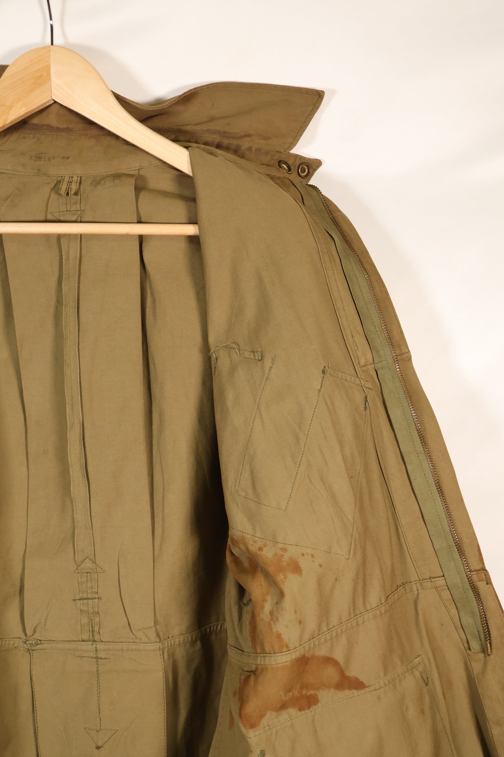 1940s 40R WWII M42 jump jacket without waist belt, stained, used.