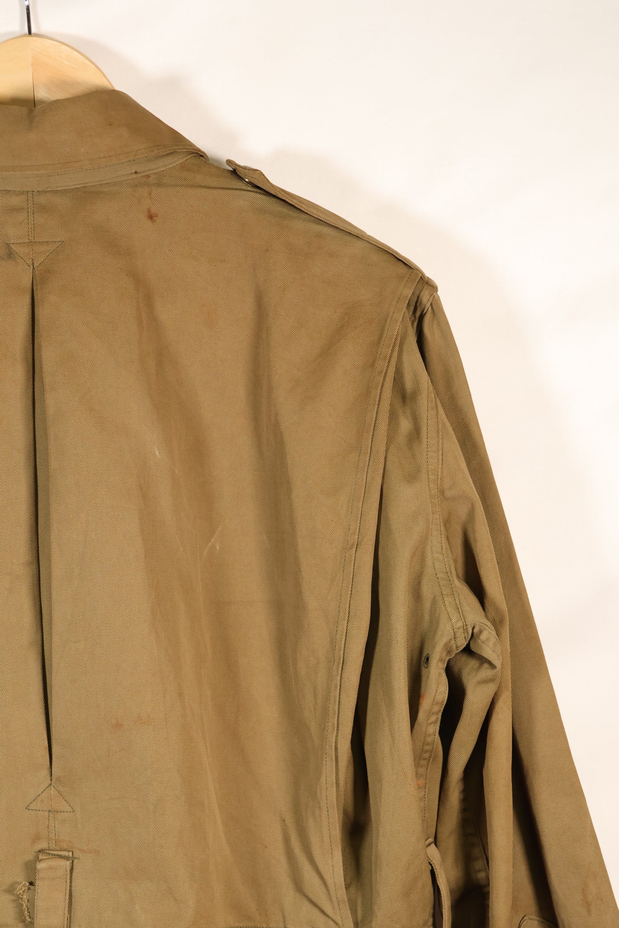1940s 40R WWII M42 jump jacket without waist belt, stained, used.