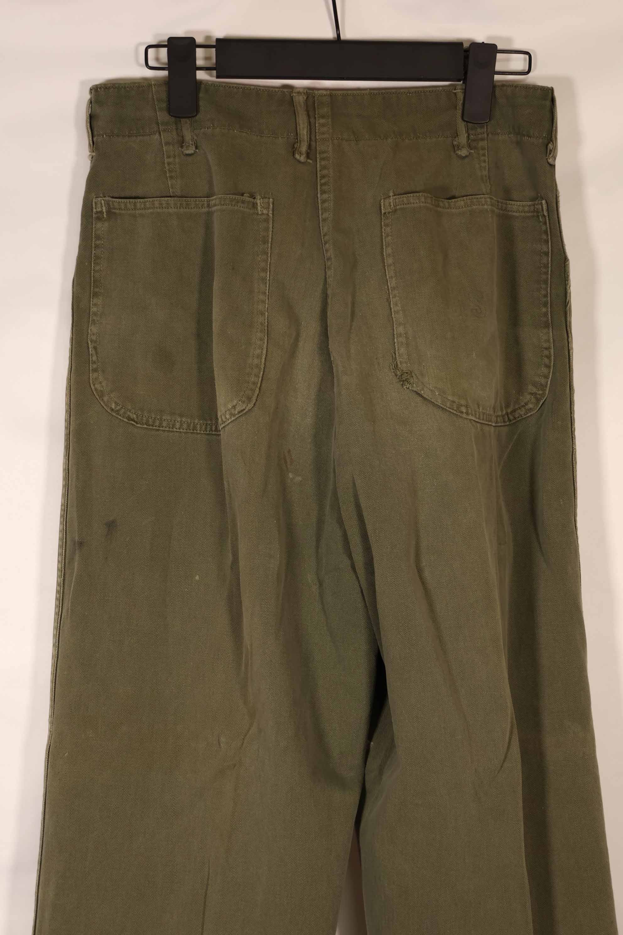 Real late 1940s - early 1950s M45 OD cotton field pants, used, strong signs of use.