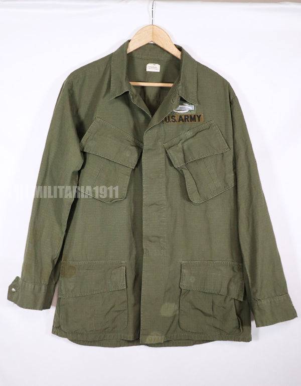 Real 1968 4th Model Jungle Fatigue Jacket, stained, patch included.