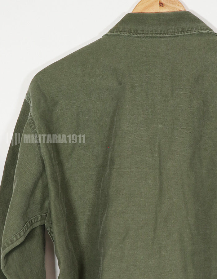 Real early OG-107 utility shirt with special forces patch, faded, used.