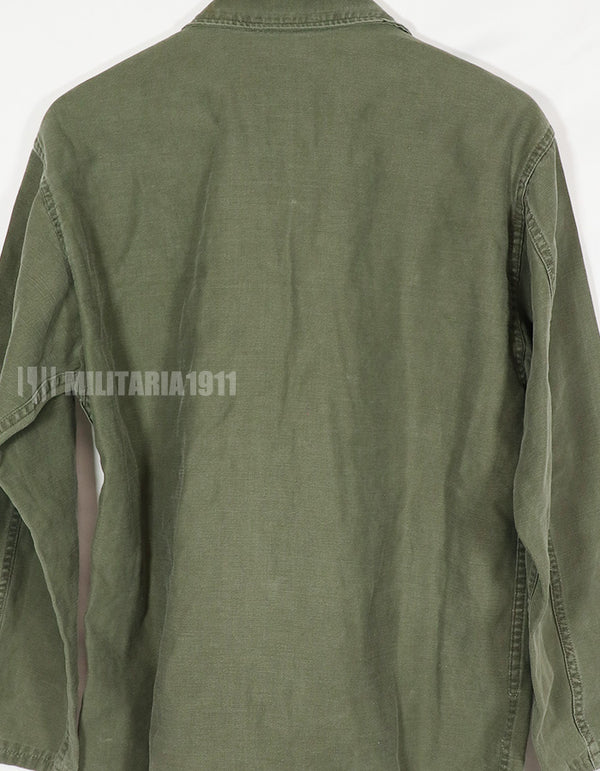 Real early OG-107 utility shirt with special forces patch, faded, used.