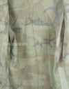 Original U.S. Army Woodland Camouflage Jacket with patches, 1990.