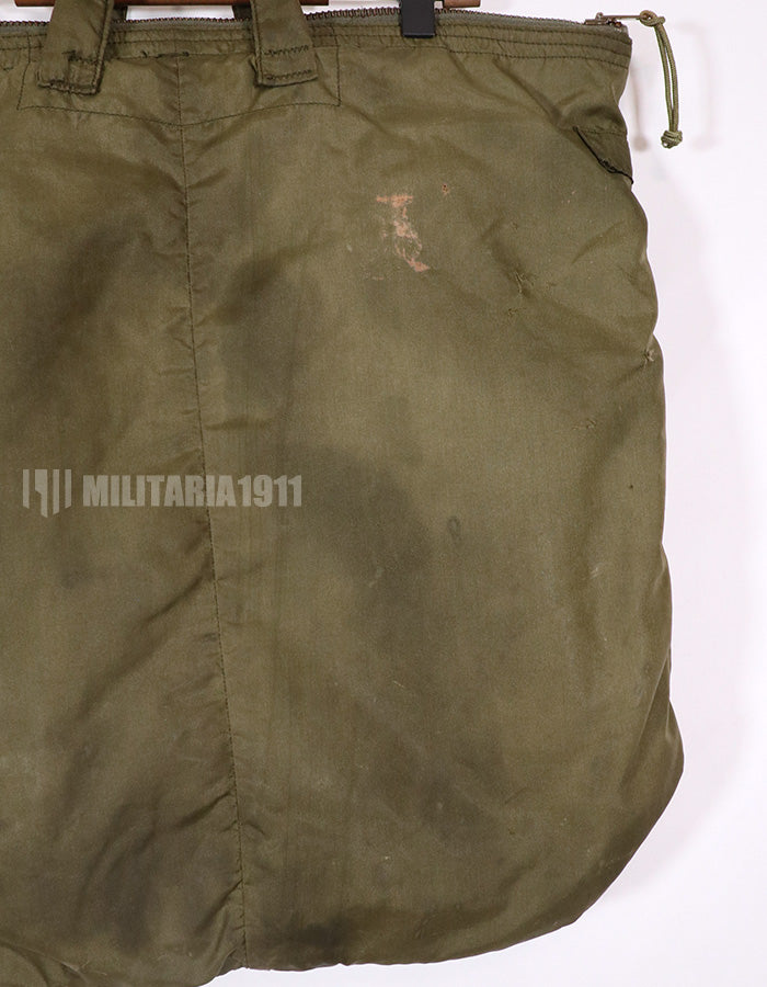 Original U.S. military release, 80's, helmet bag, poor condition, stained, age tag unreadable.