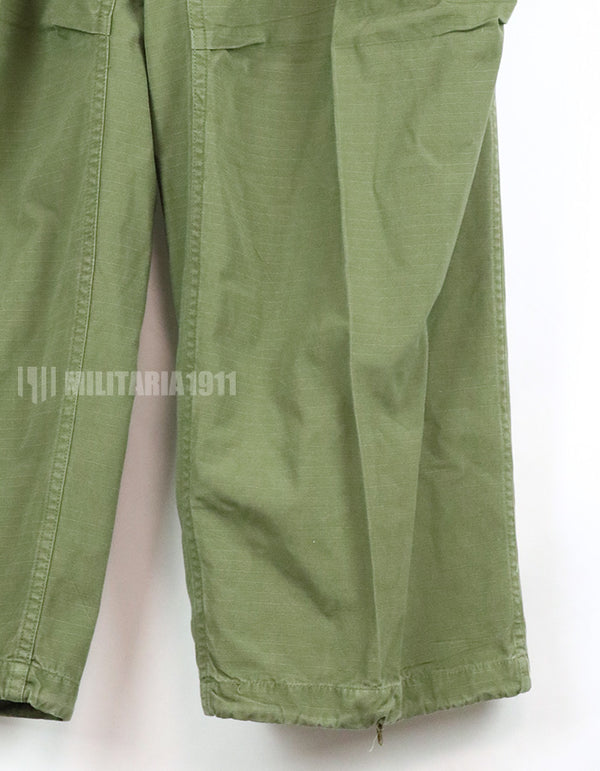 Original late model ripstop fabric jungle fatigues pants, L-S 1969, size adjustable.