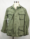 Real 2nd model jungle fatigues jacket, worn, scratched, faded.