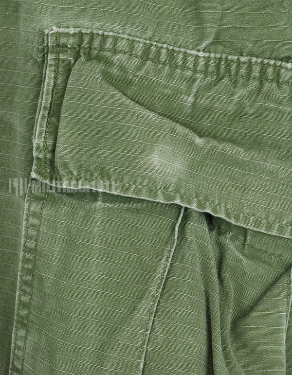 Original late model jungle fatigues pants, ripstop fabric, made in 1969, used, modified.