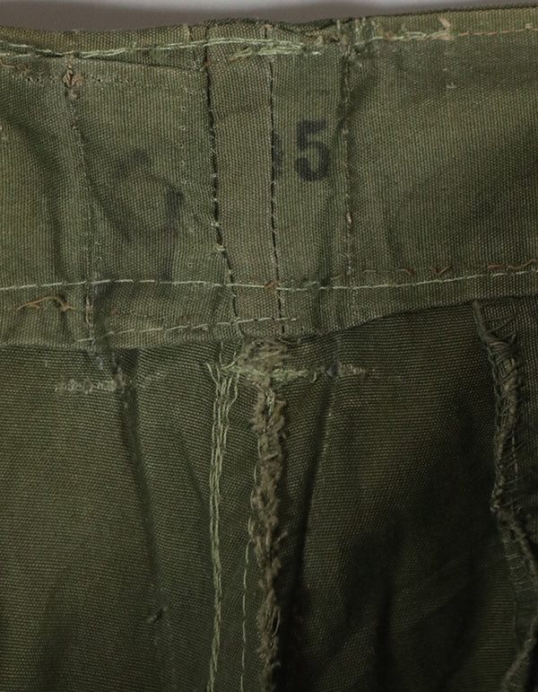 Real 1967 Poplin jungle fatigues pants, used, button damaged.