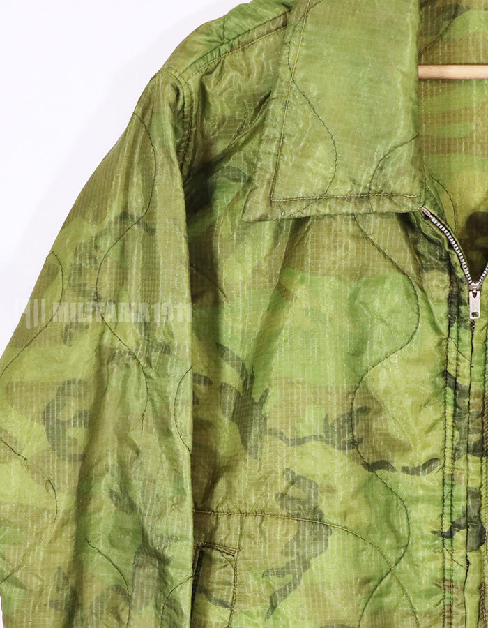 Real U.S. Army poncho, suvania jacket, no embroidery.