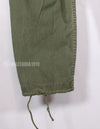 Real poplin fabric Jungle Fatigues pants, stained, used.